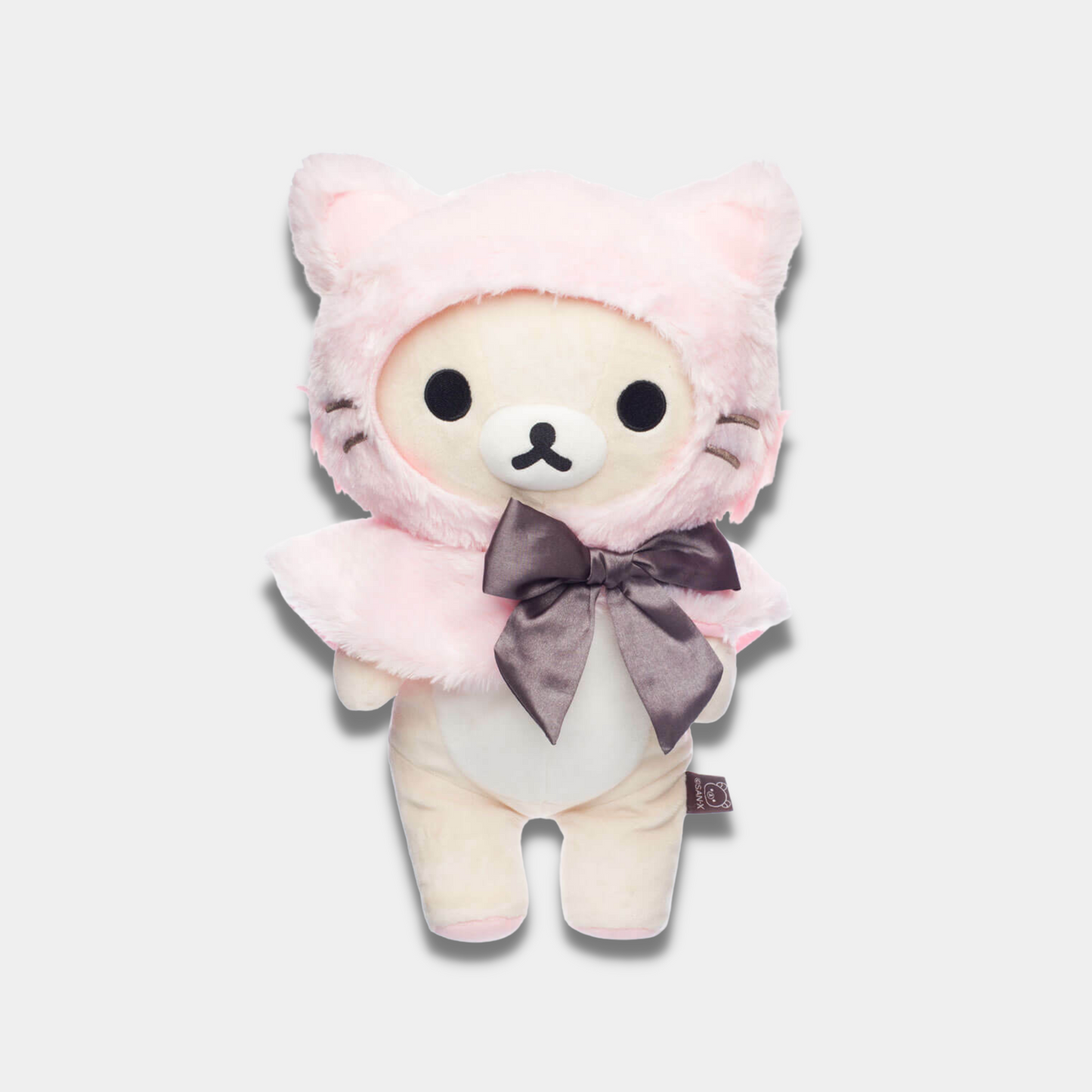 Korilakkuma Dressed in a Pink Hooded Cat Capelet