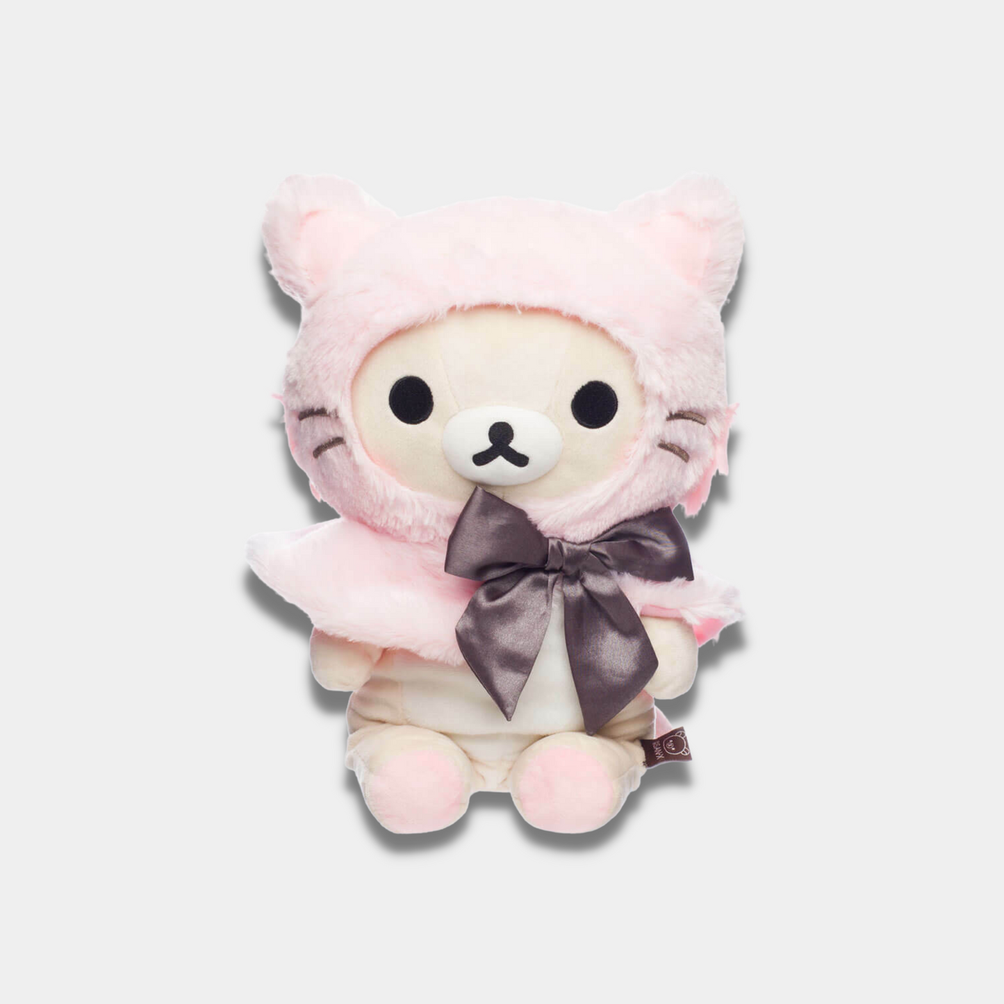 Korilakkuma Dressed in a Pink Hooded Cat Capelet